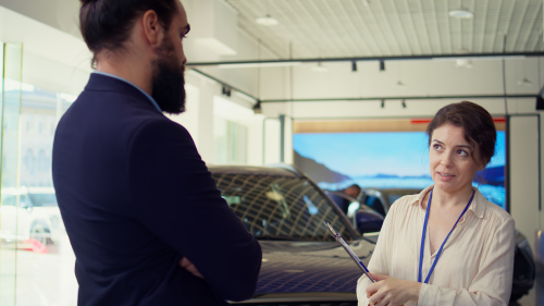 People at a car dealership