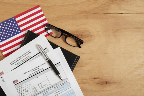 Documents, flag and glasses