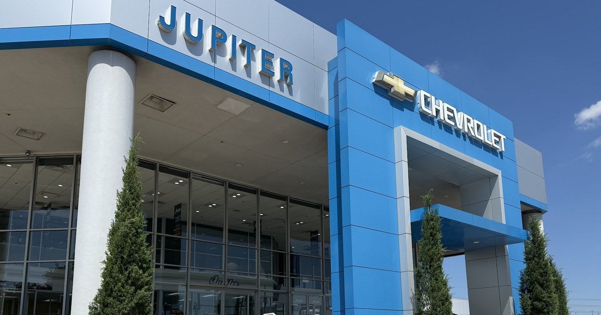 Jupiter Chevrolet showroom entrance and signage in Garland, TX